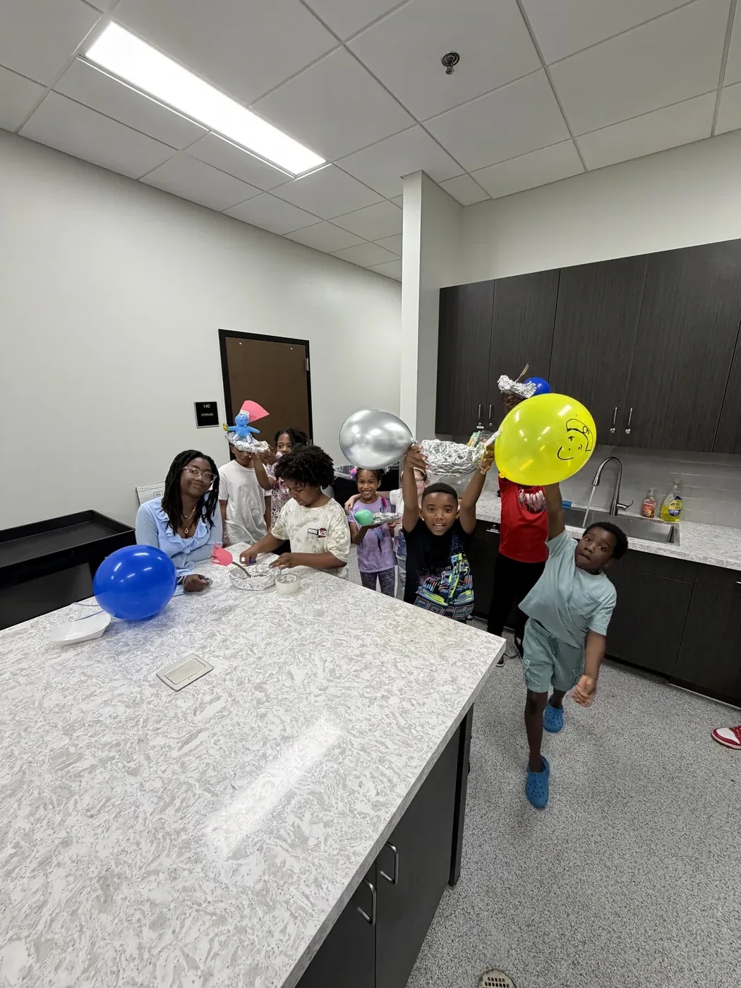Students launching balloon rockets